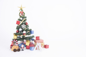 Christmas decorative with gift box and snowflake on christmas tree and white background.