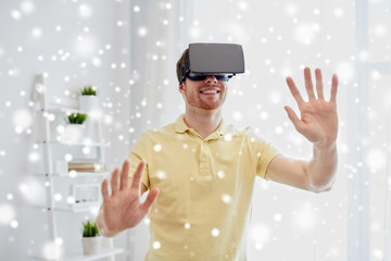 Wall Mural - young man in virtual reality headset or 3d glasses