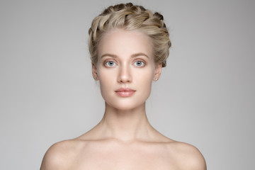 Portrait Of A Beautiful Young Blond Woman With Braid Crown Hairs