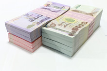 Thai Currency On White Background ,Stack Of Thai Baht