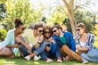 © WavebreakMediaMicro - Group of friends using mobile phone