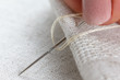 Lien fabric with needle and thread