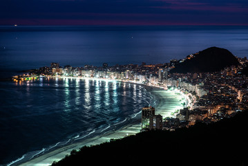 Fototapete - View of brightly illuminated Copacabana beach in Rio de Janeiro at night