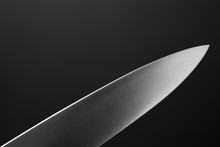 Big Kitchen Knife Close Up On Dark Background