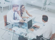 © ASDF - Three successful business person working.  High view