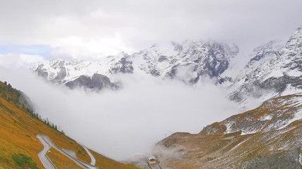 Wall Mural - Clouds in Passo Stelvio (Italy)