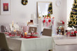 © Africa Studio - Table served for Christmas dinner in living room