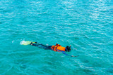 Fototapeta Do akwarium - Snorkeling in tropical Maldives island .