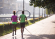 © .shock - young multiethnic couple jogging in the city