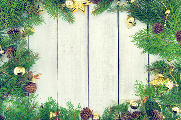 Wall Mural - Frame from decorated Christmas tree on rustic wooden background