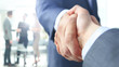© ASDF - Closeup of a business handshake