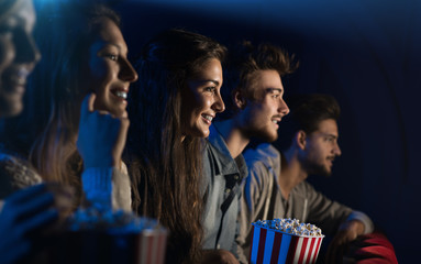 Wall Mural - Group of friends in the movie theater