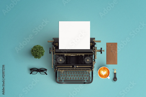 Fotografía vintage typewriter paper and cup of coffee latte art on the col