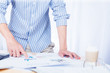 © jes2uphoto - Businessman analyze the charts and graphs showing the results startup success concept