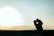 © NDABCREATIVITY - Couple dancing during sunset