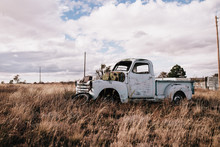 Close-up Of An Abandoned Truck In The Field