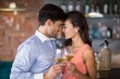 © WavebreakmediaMicro - Romantic young couple toasting wine glasses