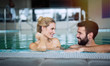 Romantic couple enjoying thermal bath