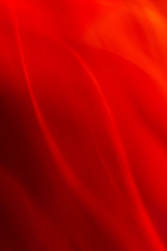 Red blurred abstract background. Light in motion