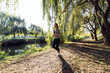 © NDABCREATIVITY - Fit female jogger running in nature