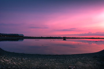 Wall Mural - Beautiful landscape at sunset salt Farm. Salt Farm is the place with so much sea-salt production in the country, Thailand.