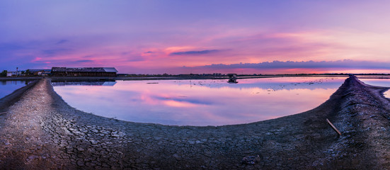 Wall Mural - Beautiful landscape at sunset salt Farm. Salt Farm is the place with so much sea-salt production in the country, Thailand.