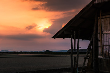 Wall Mural - Beautiful landscape at sunset salt Farm. Salt Farm is the place with so much sea-salt production in the country, Thailand.