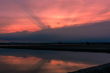 Wall Mural - Beautiful landscape at sunset salt Farm. Salt Farm is the place with so much sea-salt production in the country, Thailand.