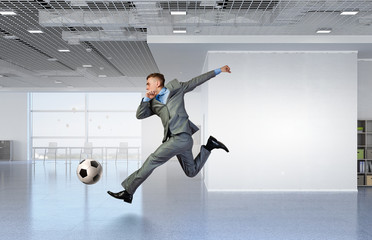 Wall Mural - Playing office soccer