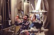 © WavebreakMediaMicro - Owner and worker examining beer in glass