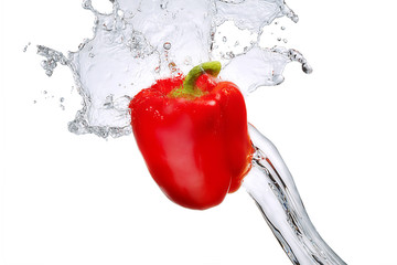 Wall Mural - Water splash and vegetables isolated on white backgroud with clipping path. Fresh bell pepper