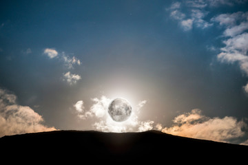 Wall Mural - raising of full moon above mountain