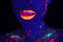 Portrait Of Beautiful Fashion Woman In Neon UF Light. Model Girl With Fluorescent Creative Psychedelic MakeUp, Art Design Of Female Disco Dancer Model In UV, Colorful Abstract Make-Up