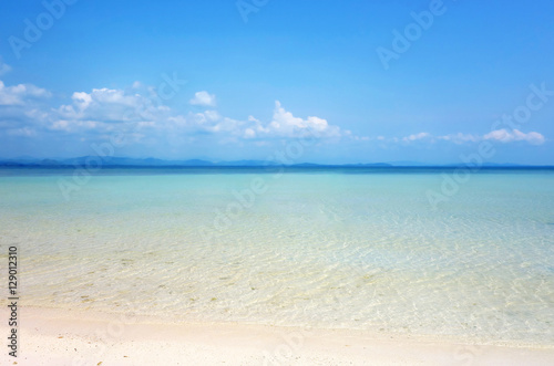 White Clouds On Blue Sky Over Calm Sea Clear Blue Sky With