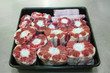 Fresh Raw Beef Oxtail Meat cut, ready to cook. Beef oxtail on black bowl