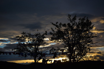 Evening sunset on mountain hills of Simon village. Bran.