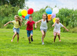 © JackF - Children running with colorful balloons