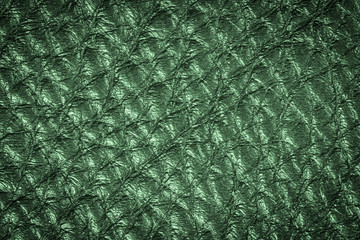 Green leather texture background for design with copy space for text or image.