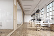 © ImageFlow - Front view of an office interior with massive ceiling lamps