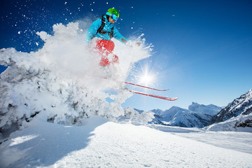 Poster - Freeride skier jumping from rock