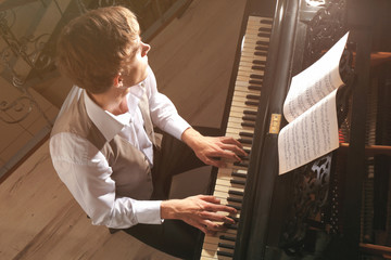 Wall Mural - Man playing piano