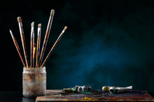 Paint Brushes With A Palette.