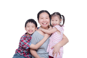 Wall Mural - Asian mother and her children smiling over white background