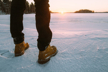 an image of winter shoes in snow, close-up