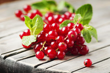 Red Currant And Mint On The Wooden Table