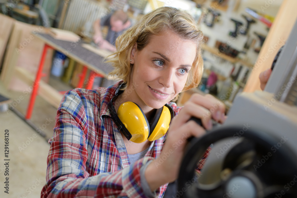 woman working in a factory Stock Photo | Adobe Stock
