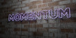 MOMENTUM - Glowing Neon Sign on stonework wall - 3D rendered royalty free stock illustration.  Can be used for online banner ads and direct mailers..