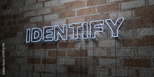 Fotografía IDENTIFY - Glowing Neon Sign on stonework wall - 3D rendered royalty free stock illustration