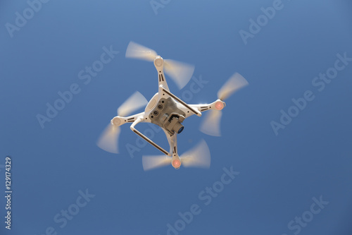 White Quadrotor Helicopter Buy This Stock Photo And