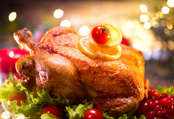 Wall Mural - Christmas holiday decorated table with turkey. Christmas family dinner